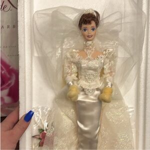 Mattel Collector Doll in Wedding Attire and one Avon Barbie